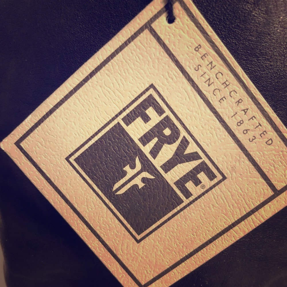 Frye Harness boot w/ belt detail & stacked heel.